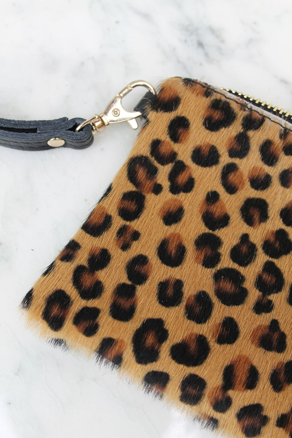 Absolème pochette en cuir motif léopard